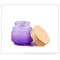 Matte purple glass bottles with wooden color cap